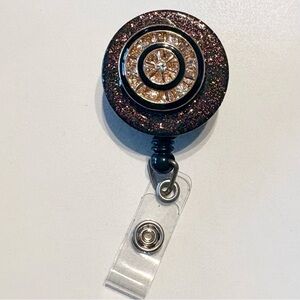 Retractable badge holder